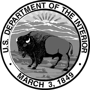 Logo of the U.S. Department of the Interior in a small, round format