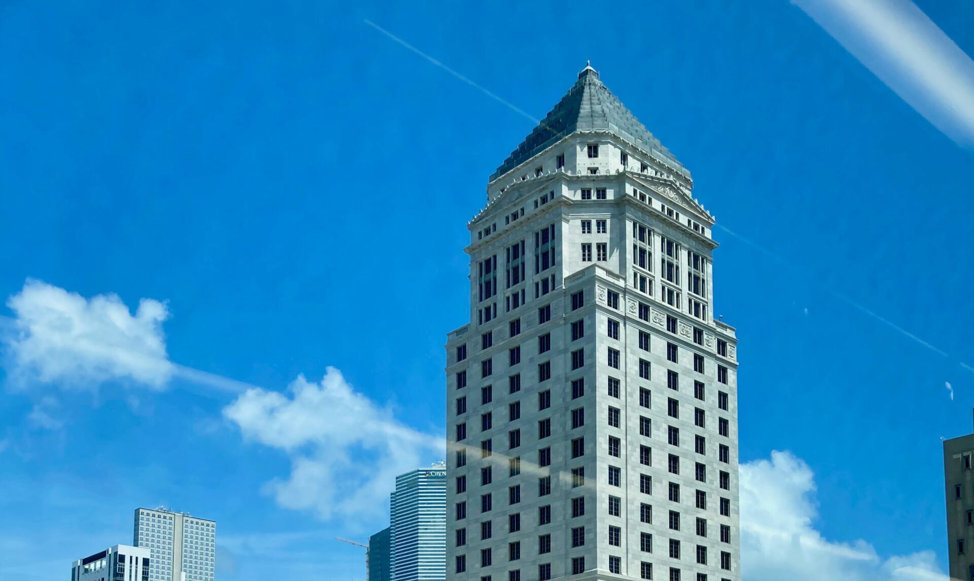 A tall municipal building located in the downtown of a city