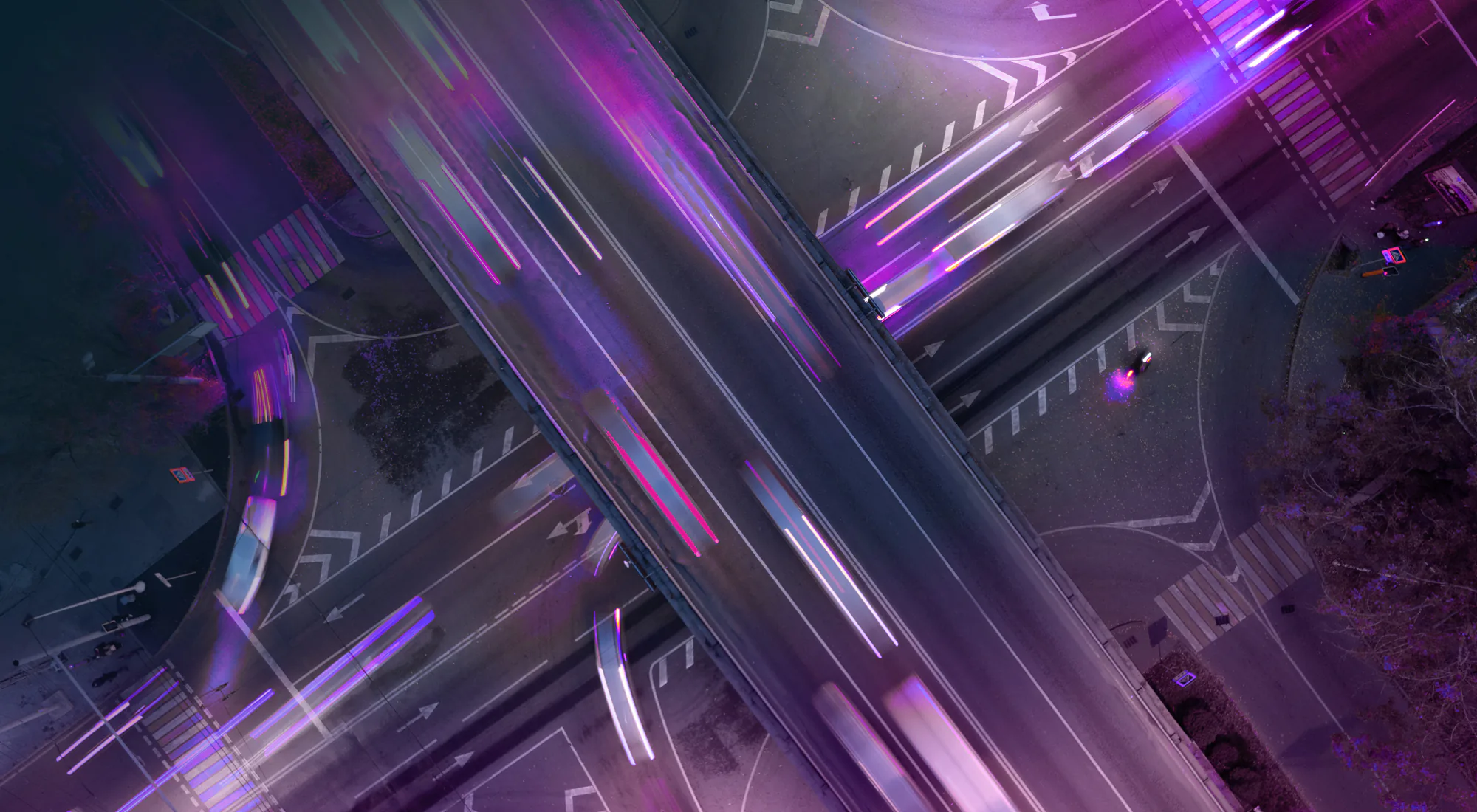 A time lapse of cars rushing down a freeway creating purple blurs in the Lynkwell colors