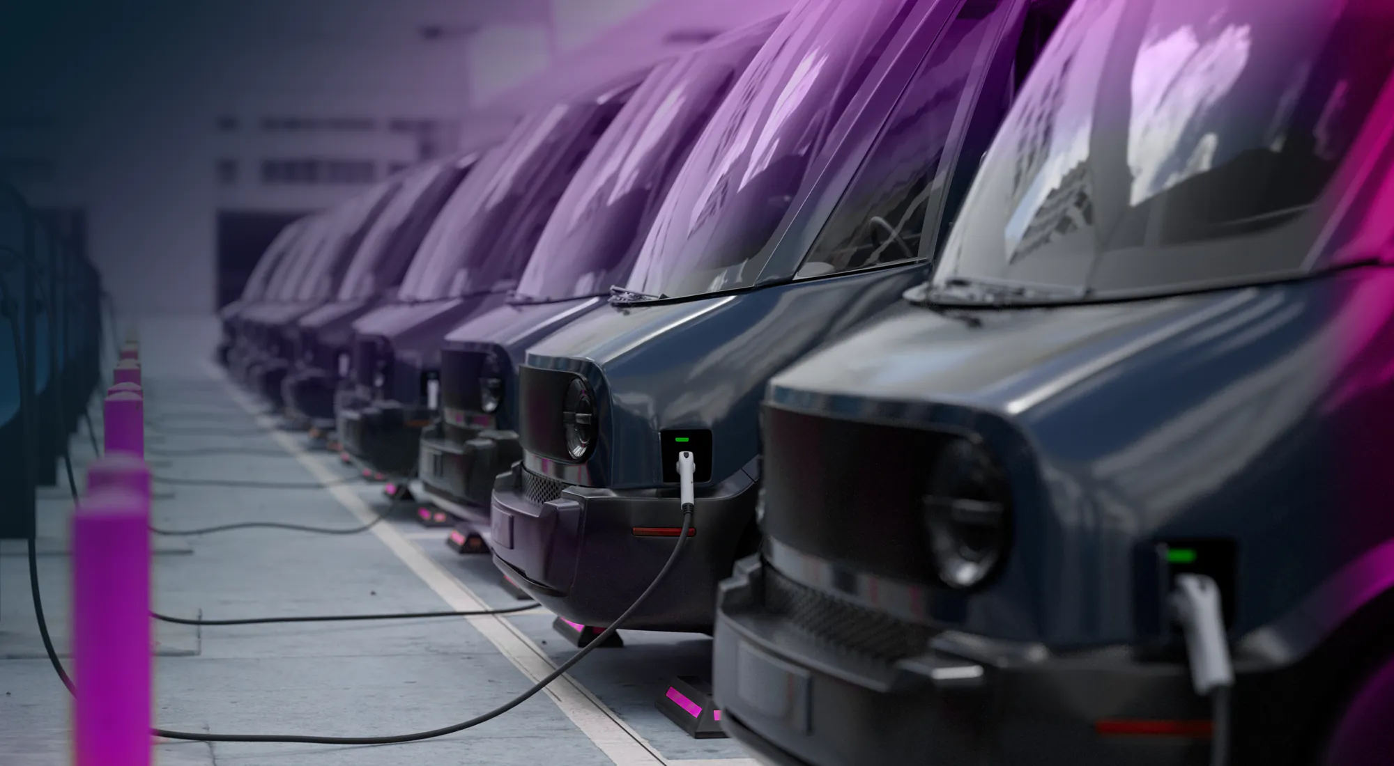 A series of fleet trucks lined up and charging using Lynkwell's EV fleet charging solutions